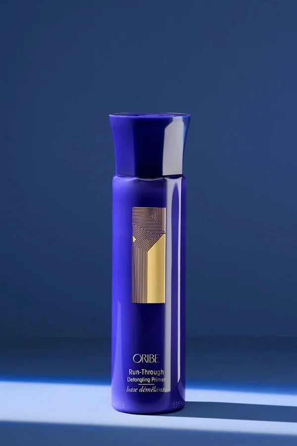 A standard 175 ml size primer of Oribe Run-Through Detangling Primer