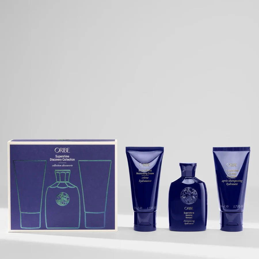 Oribe hair care product set, Supershine Discovery Collection with packaging on a white background