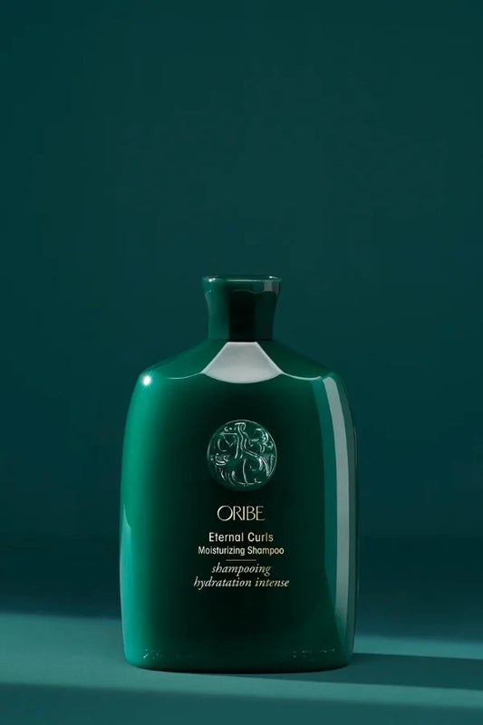 A standard 250 ml bottle of Oribe Eternal Curls Moisturizing Shampoo