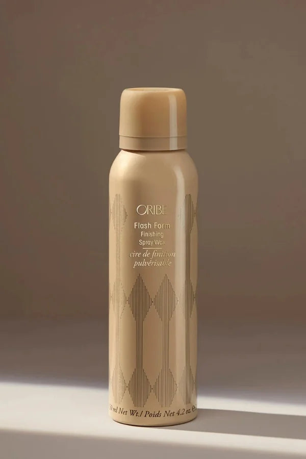 A standard 150 ml spray bottle of Oribe Flash Form Finishing Spray Wax