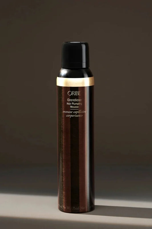 A standard 5.7 oz bottle of Grandiose Hair Plumping Mousse
