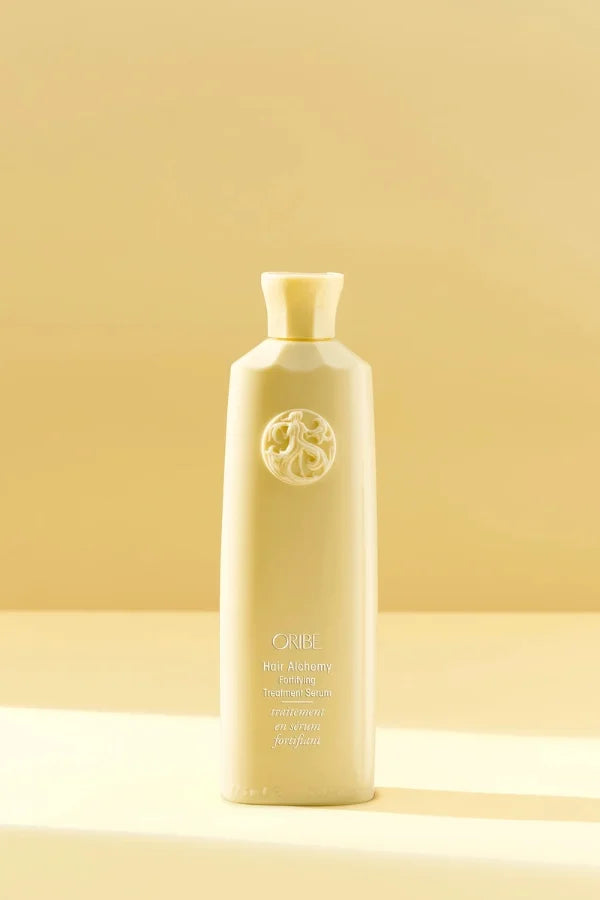 A standard 175 ml bottle of Hair Alchemy Fortifying Treatment Serum