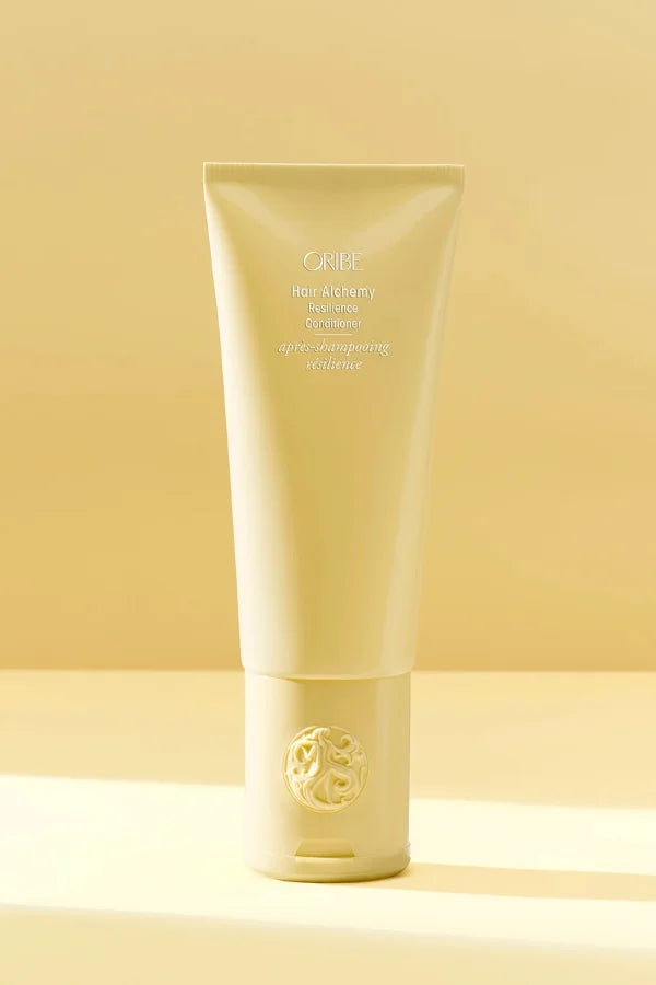 A standard 200 ml bottle of Hair Alchemy Resilience Conditioner
