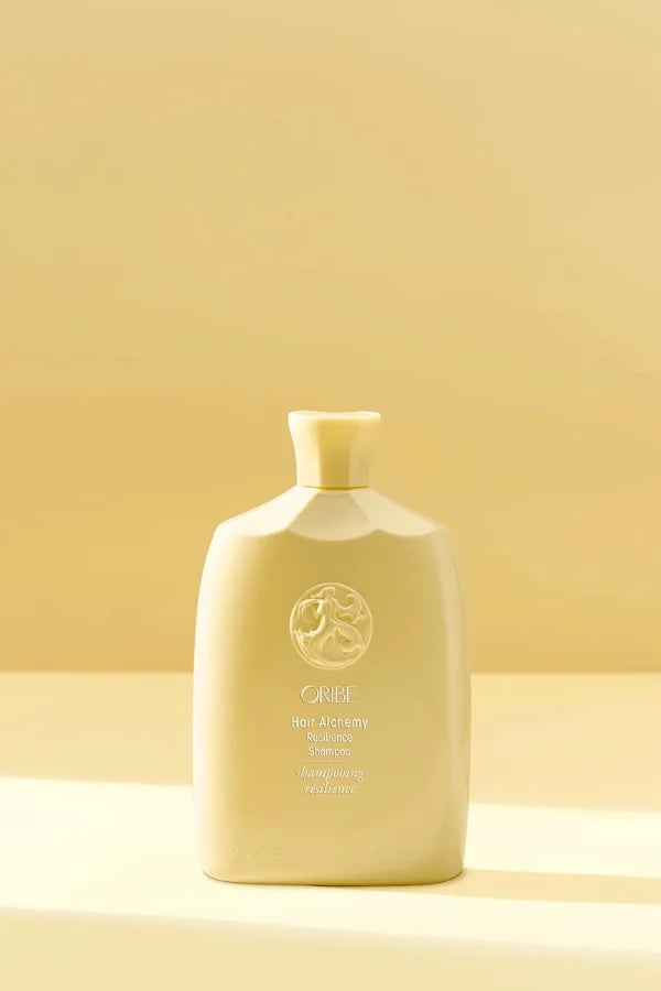 A standard 250 ml bottle of Hair Alchemy Resilience Shampoo
