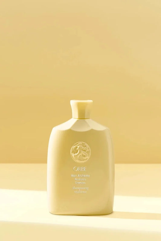 A standard 250 ml bottle of Hair Alchemy Resilience Shampoo