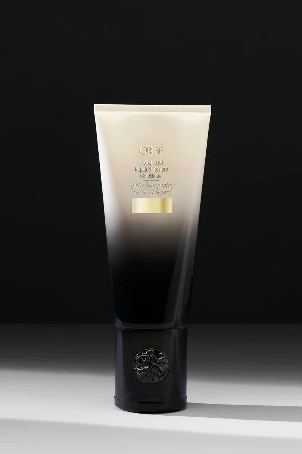 A standard 200 ml tube of Oribe Gold Lust Repair & Restore Conditioner