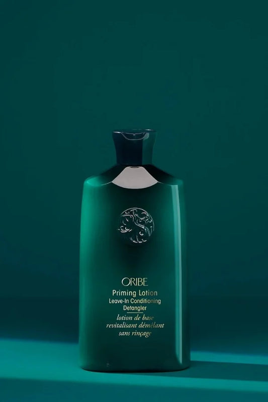 A 250 ml sized product of Oribe Priming Lotion Leave-In Conditioning Detangler