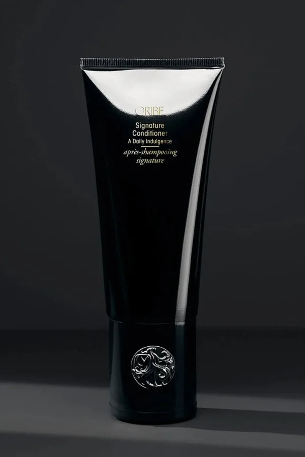 A standard 200 ml tube of Oribe Signature Conditioner