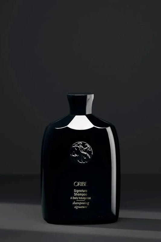 A standard 250 ml bottle of Oribe Signature Shampoo