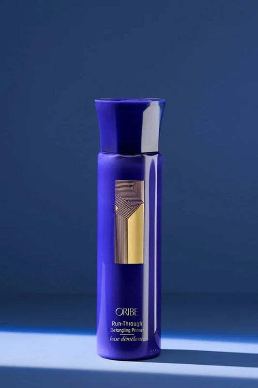A standard 175 ml size primer of Oribe Run-Through Detangling Primer