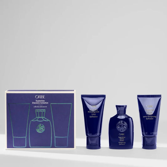 Oribe hair care product set, Supershine Discovery Collection with packaging on a white background